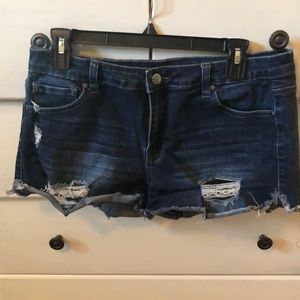 Distressed denim shorts